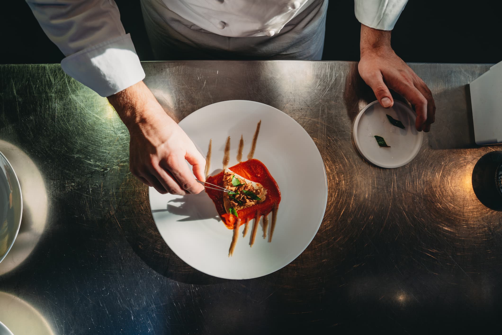 Private chef preparing dinner in the kitchen of an Italian villa